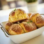 Homemade Cheesy brioche rolls from Angama Mara photo
