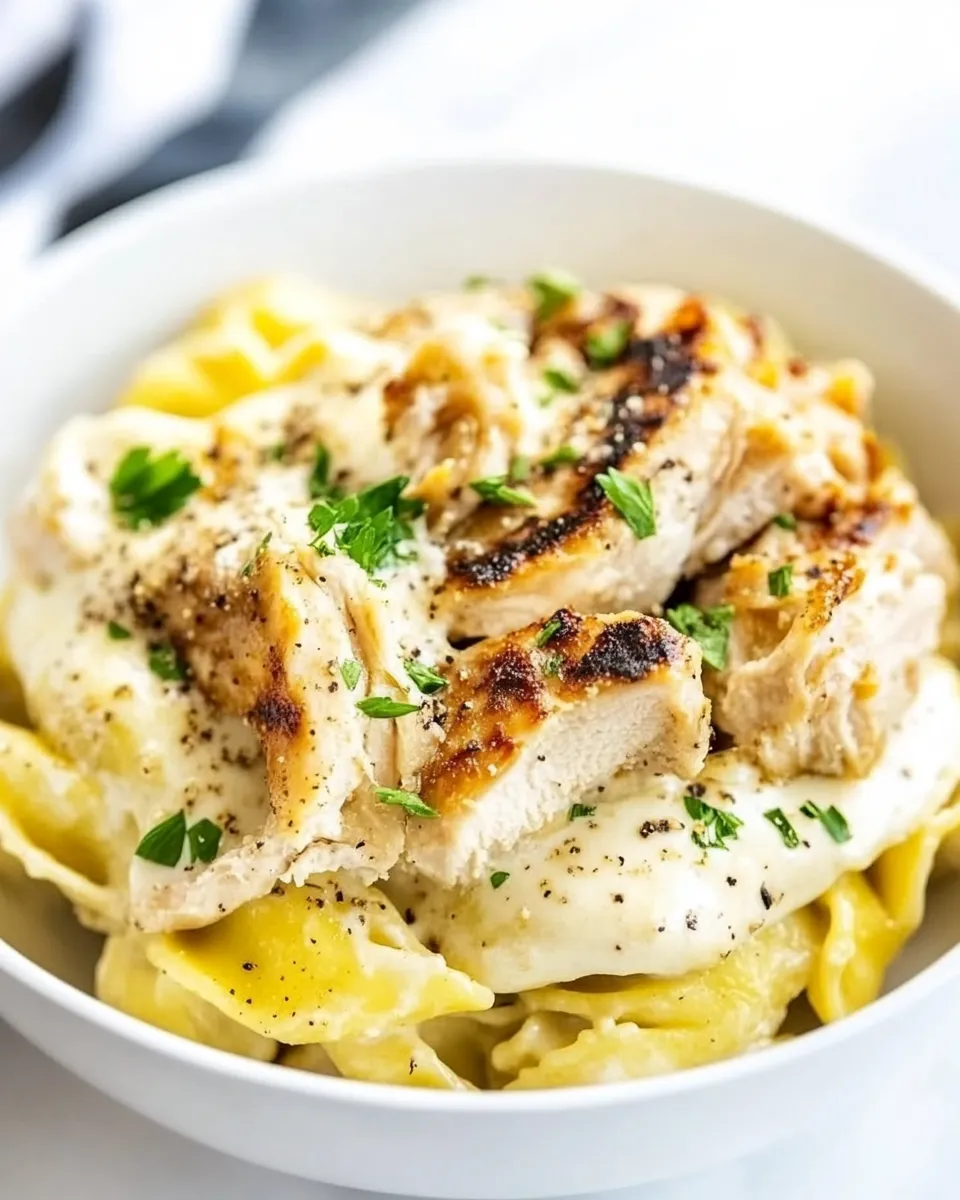 Classic Asiago Tortellini Alfredo with Grilled Chicken image