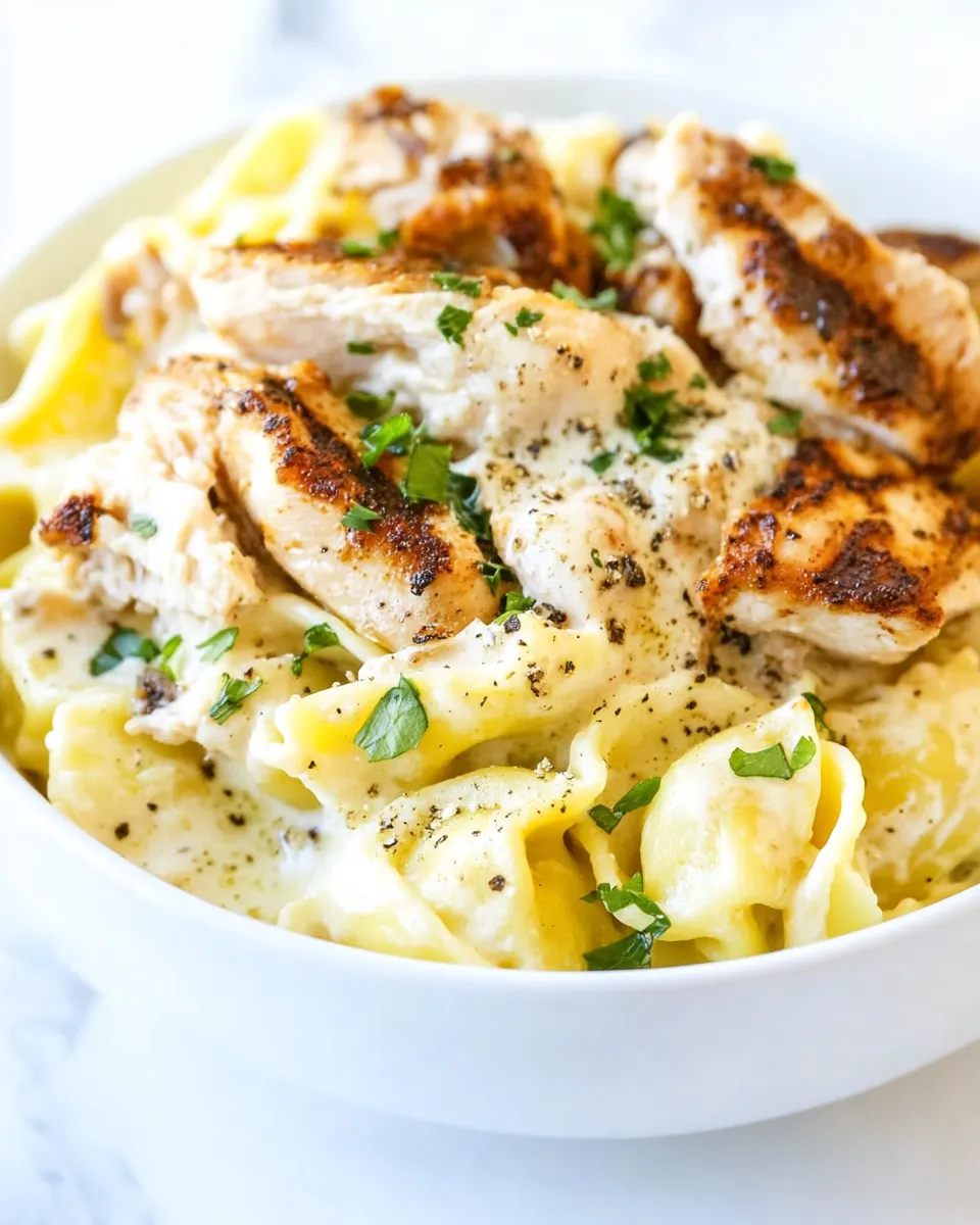 Delicious Asiago Tortellini Alfredo with Grilled Chicken shot