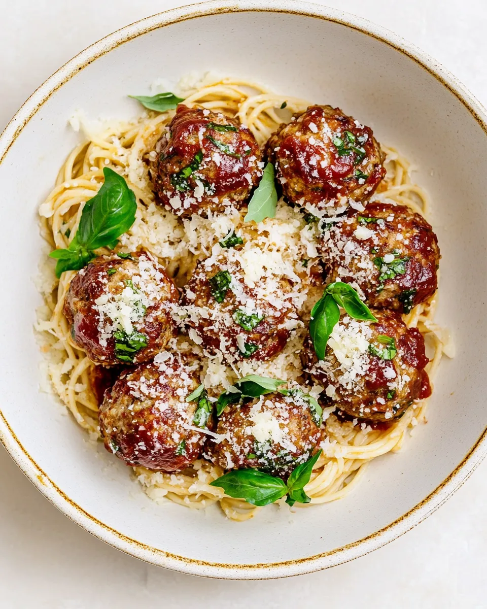 Classic Baked Chicken Parmesan Meatballs with Roasted Garlic Spaghetti. recipe photo
