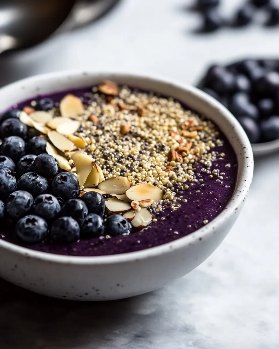 Delicious Blueberry Almond Breakfast Quinoa Smoothie Bowl dish photo