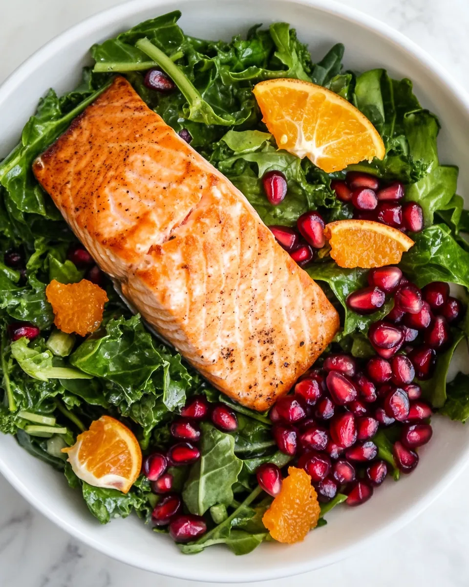 Healthy Kale Salad Recipe With Salmon, Pomegranate, And Orange-Coconut Vinaigrette recipe photo