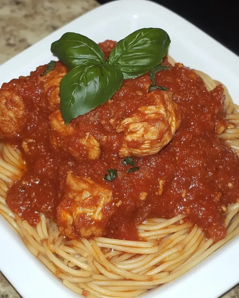 Homemade Spaghetti Rigati with Chicken and Tomato Sauce photo