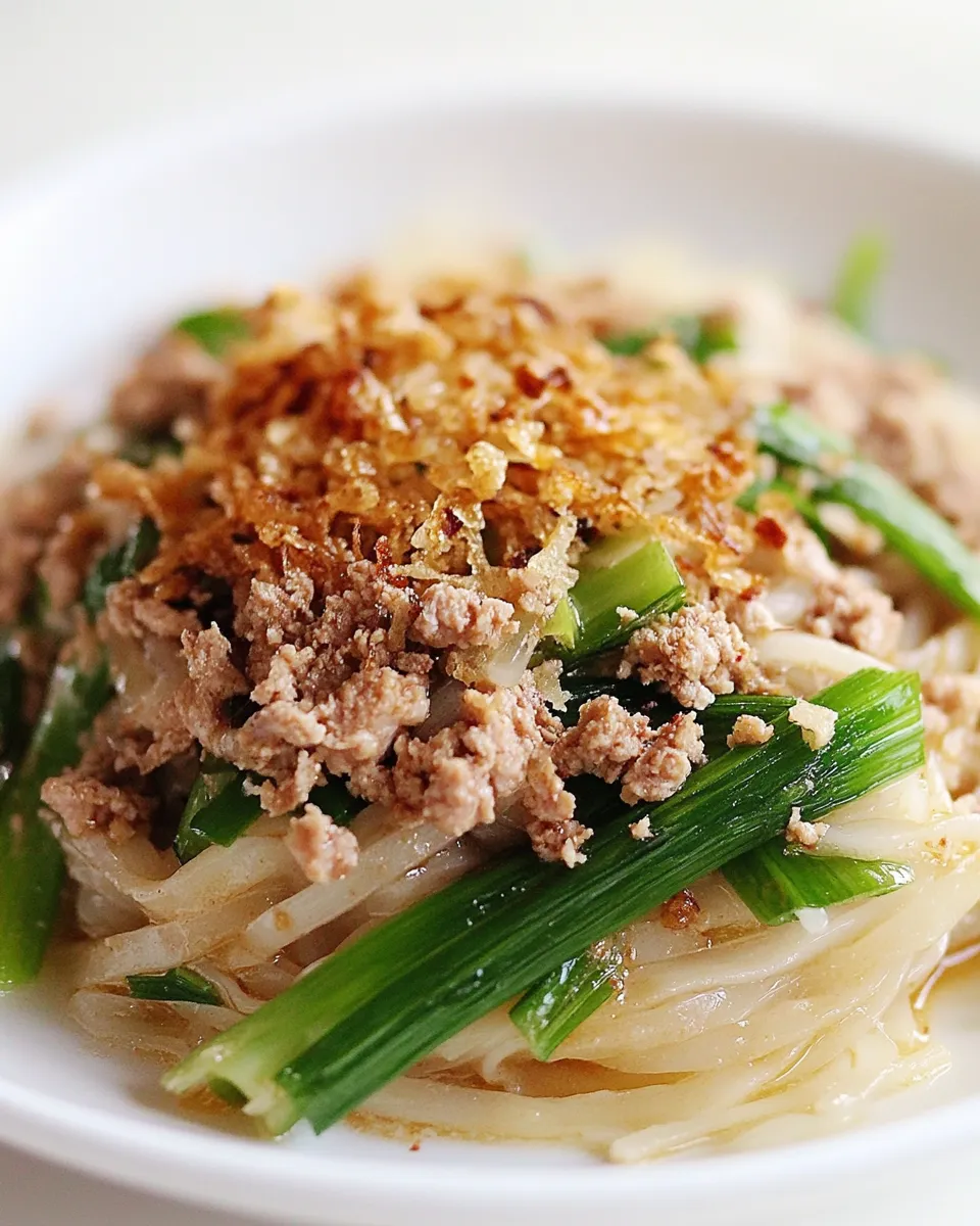 Delicious Thai Noodles with Ground Chicken and Crispy Shallots food shot